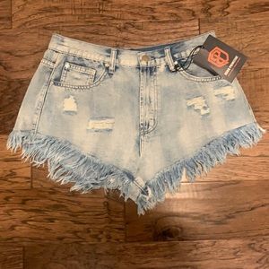 NWT Born Primitive cheeky jean shorts. Size Medium